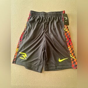 NWT Nike Dri-Fit 3Brand Black Shorts with Neon sidewalls. Boys Size Medium​
